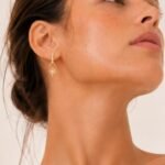 detalle-charm-estrella-brujula-oro