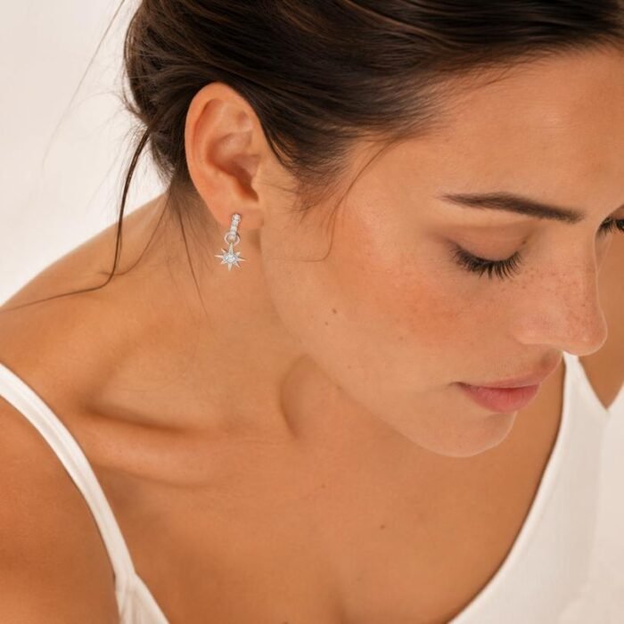 aros-colgantes-rodio-estrella-brujula-mujer